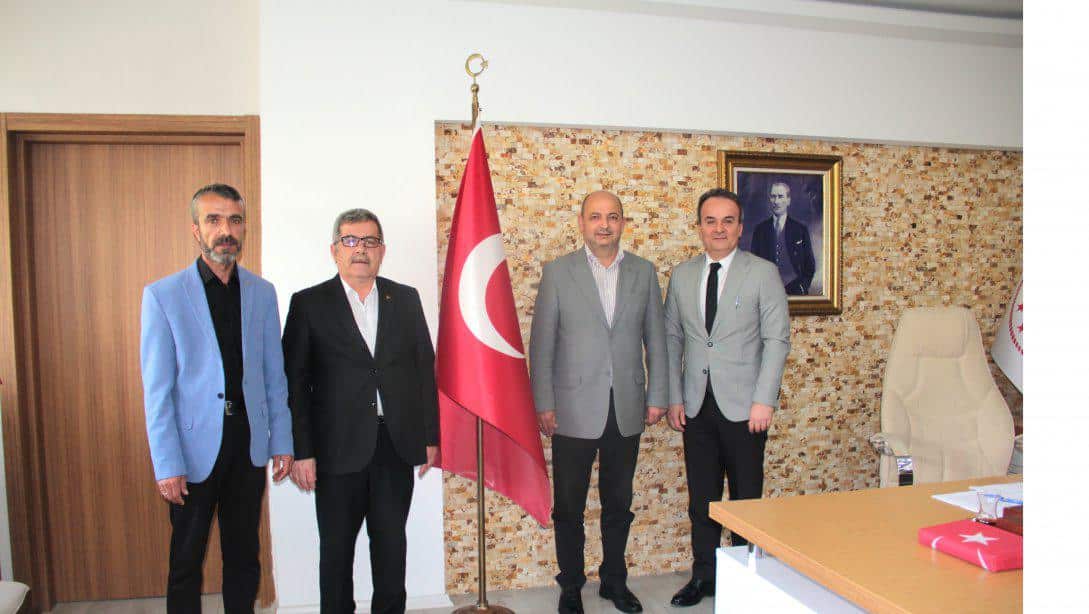 Milliyetçi Hareket Partisi (MHP)  İlçe Başkanı Mustafa Komar, İlçe Milli Eğitim Müdürümüz Murat Sertsöz'ü Ziyaret Etti.